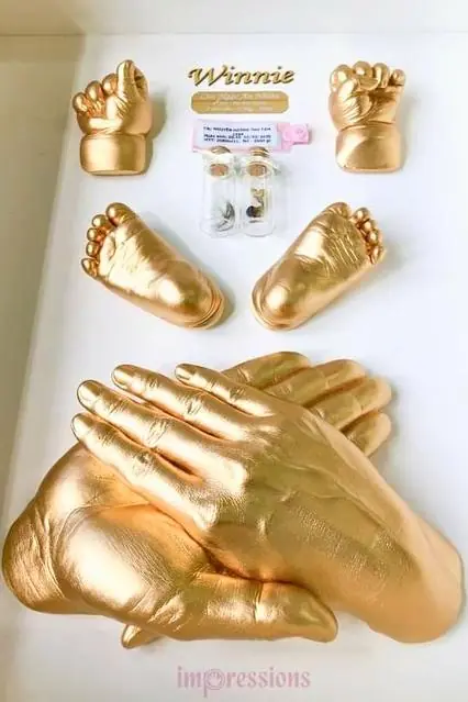 Family handcasting collage in gold