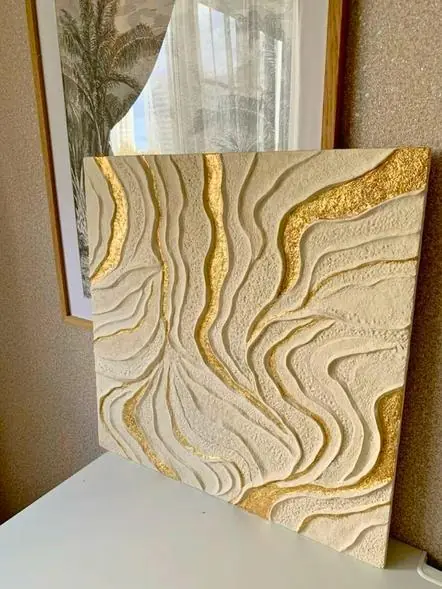 Cream texture art with flowing gold ridges