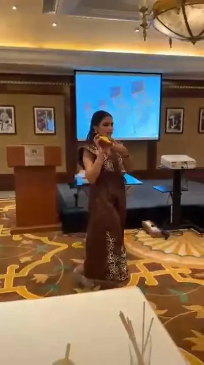 Divya presenting at a corporate workshop